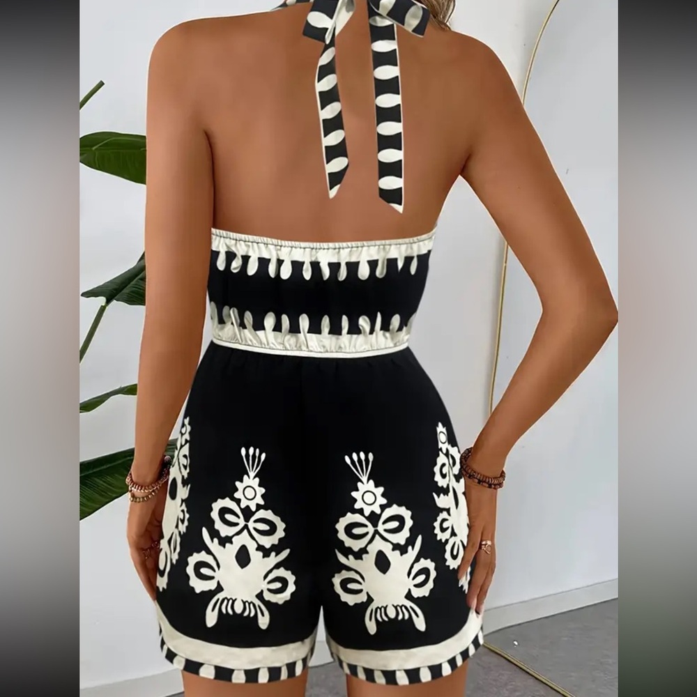 Boho Chic Black Floral halter romper Sz
Large women’s summer evening casual
NWOT - Picture 2 of 3